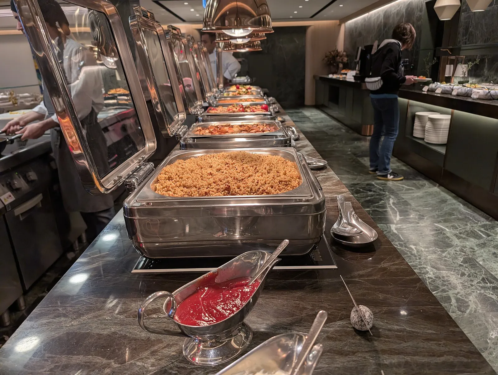 Hot buffet line of chafing dishes at a catered event