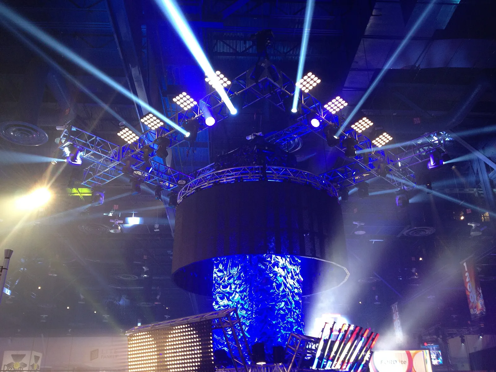 Event stage rig with moving lights and LED screens