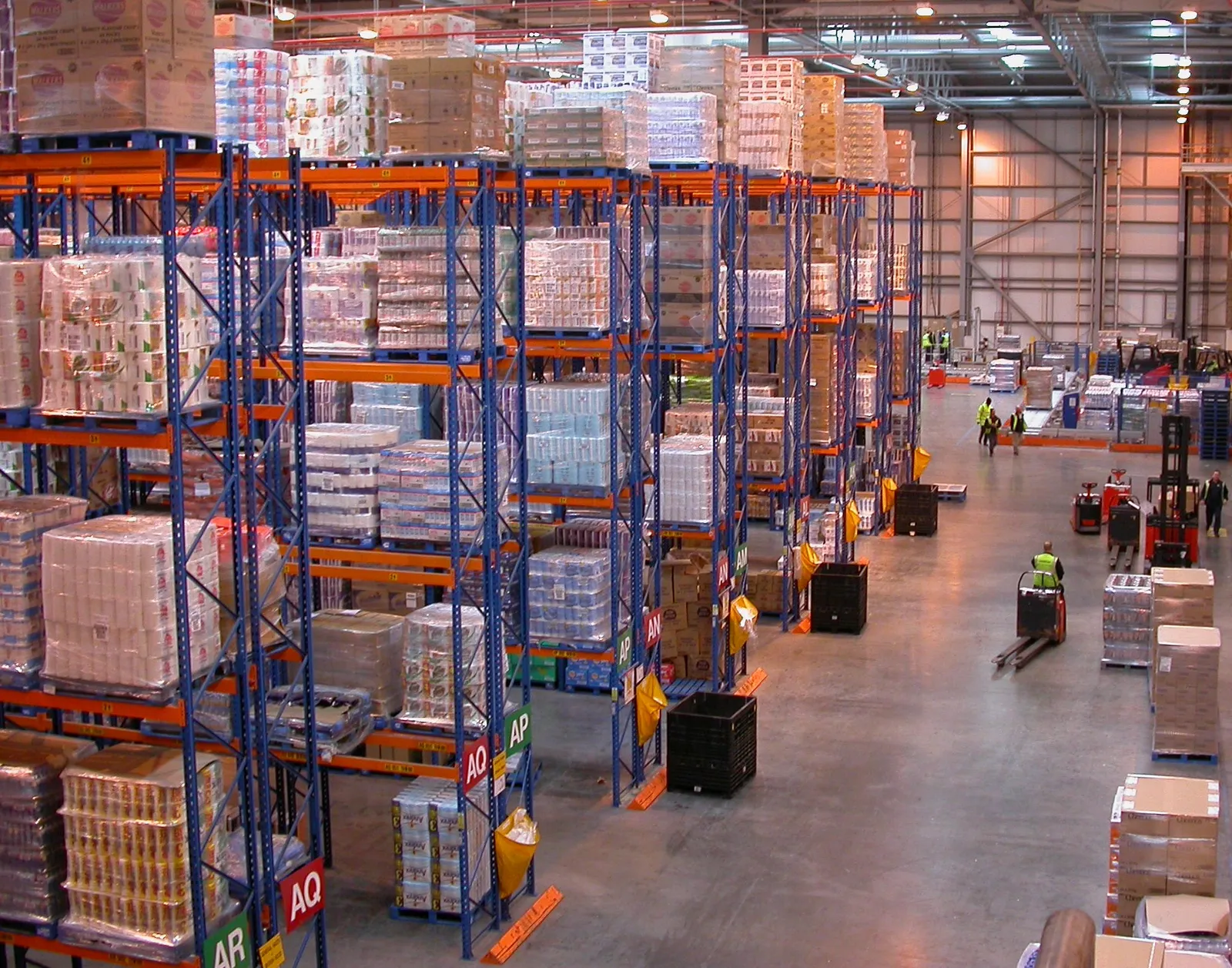 Pallet racks of grocery products in a food distribution centre
