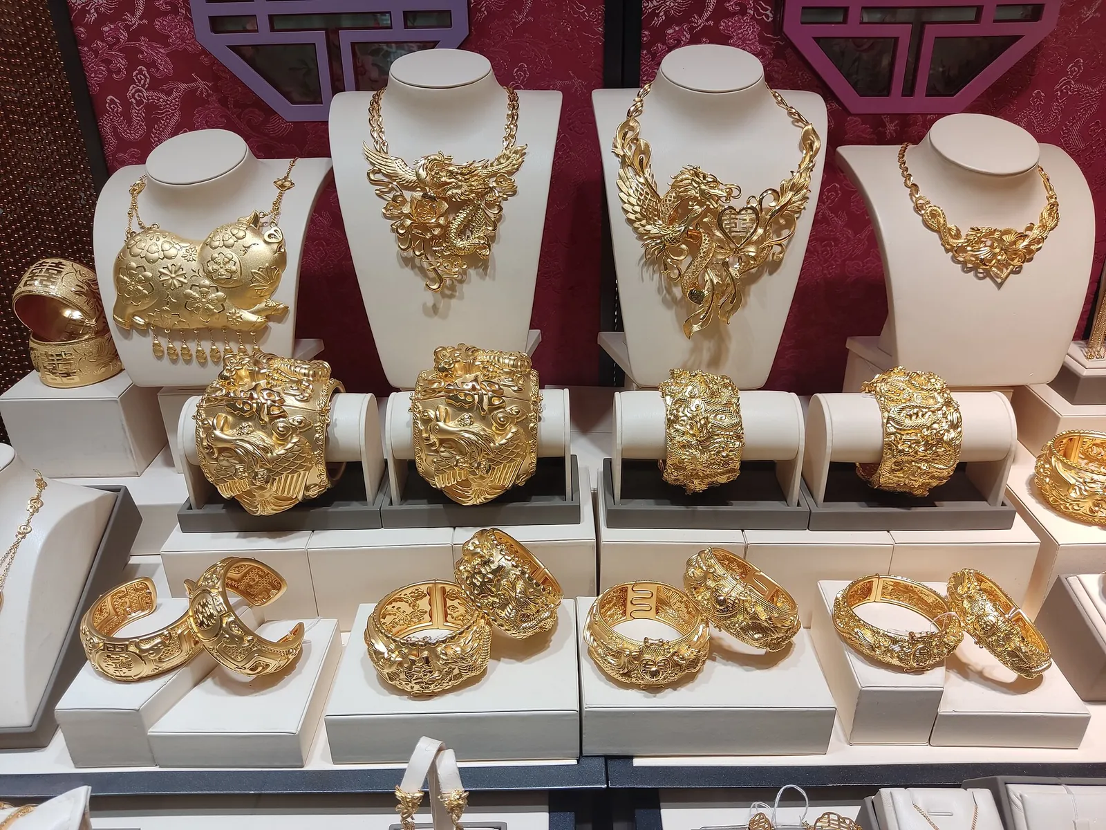 Gold necklaces and bangles in a Hong Kong jewellery shop window