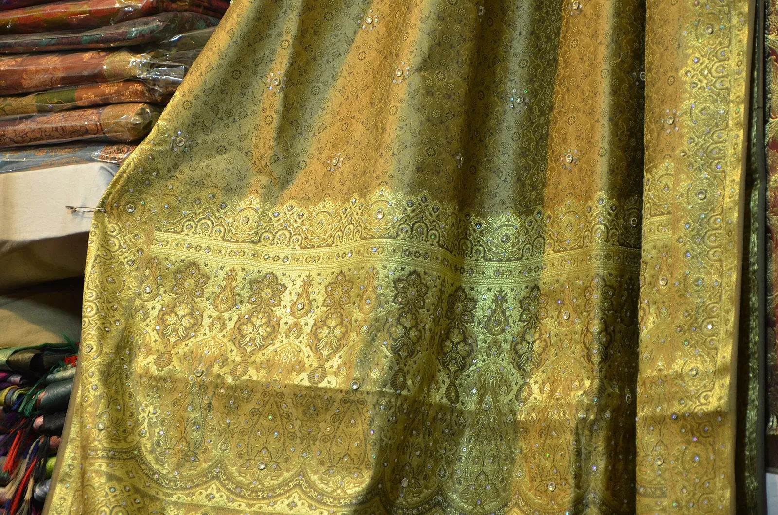 A gold silk saree on display at Dilli Haat, New Delhi