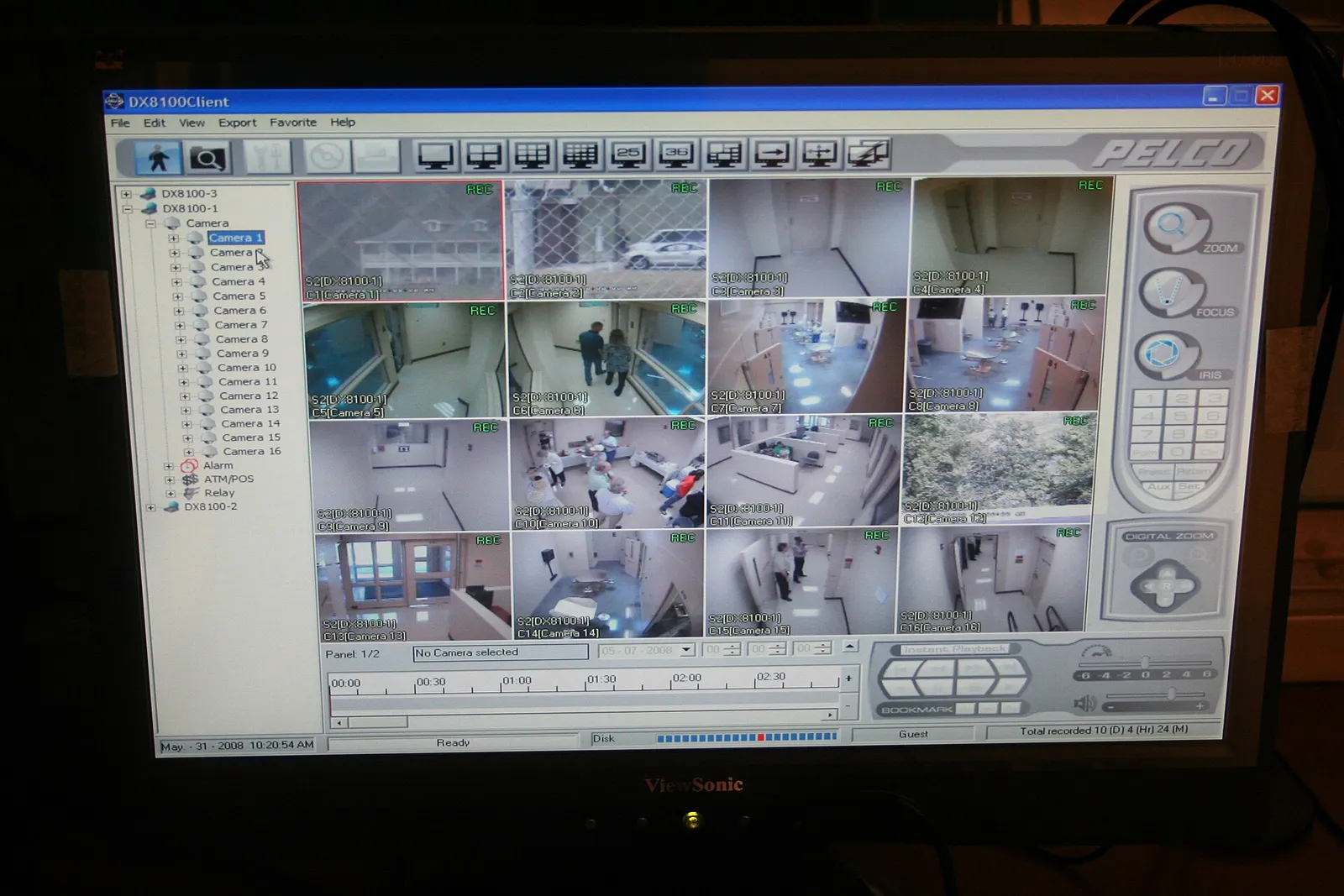 CCTV monitor displaying multiple security camera feeds