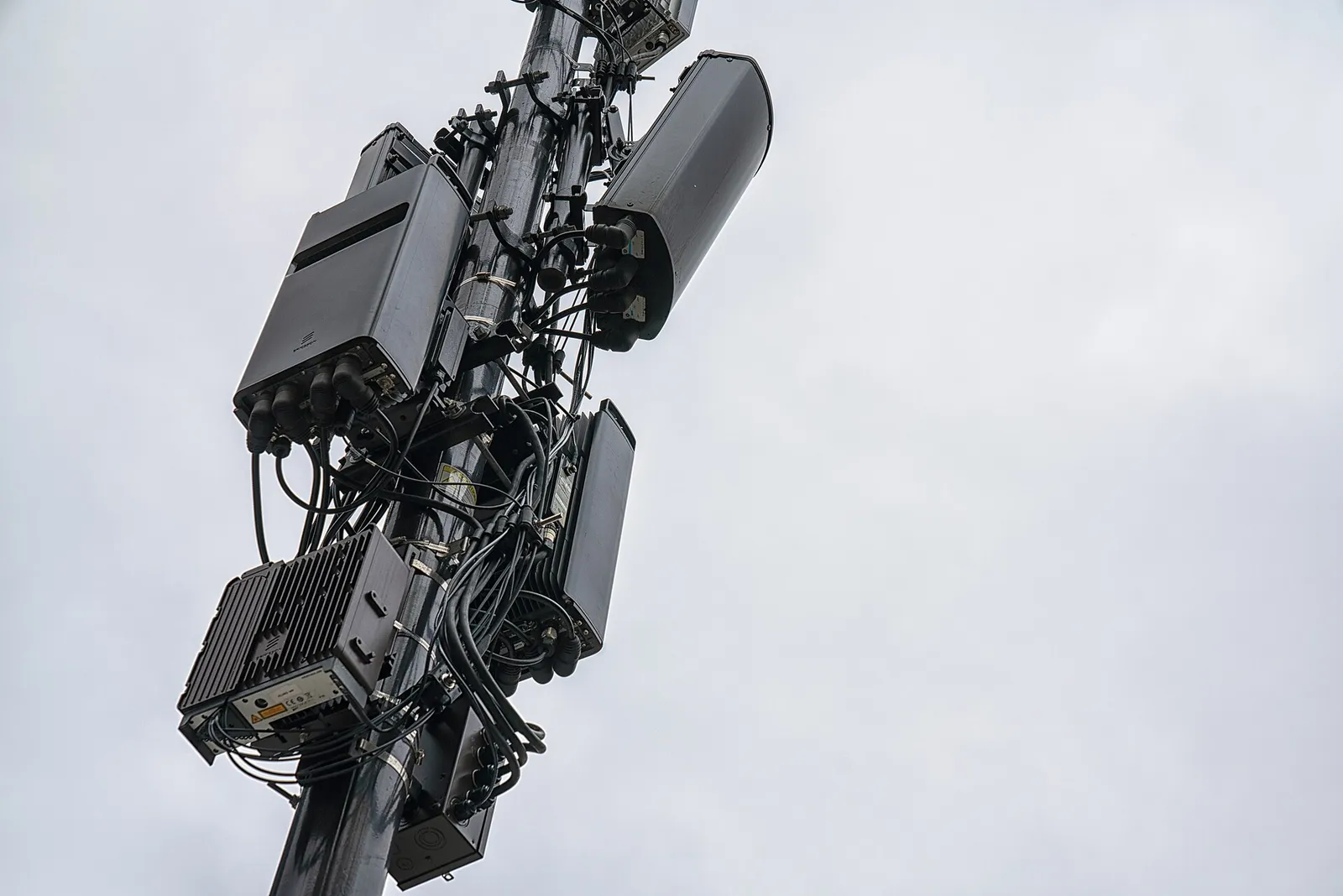 5G radio units and antennas mounted on a cell tower
