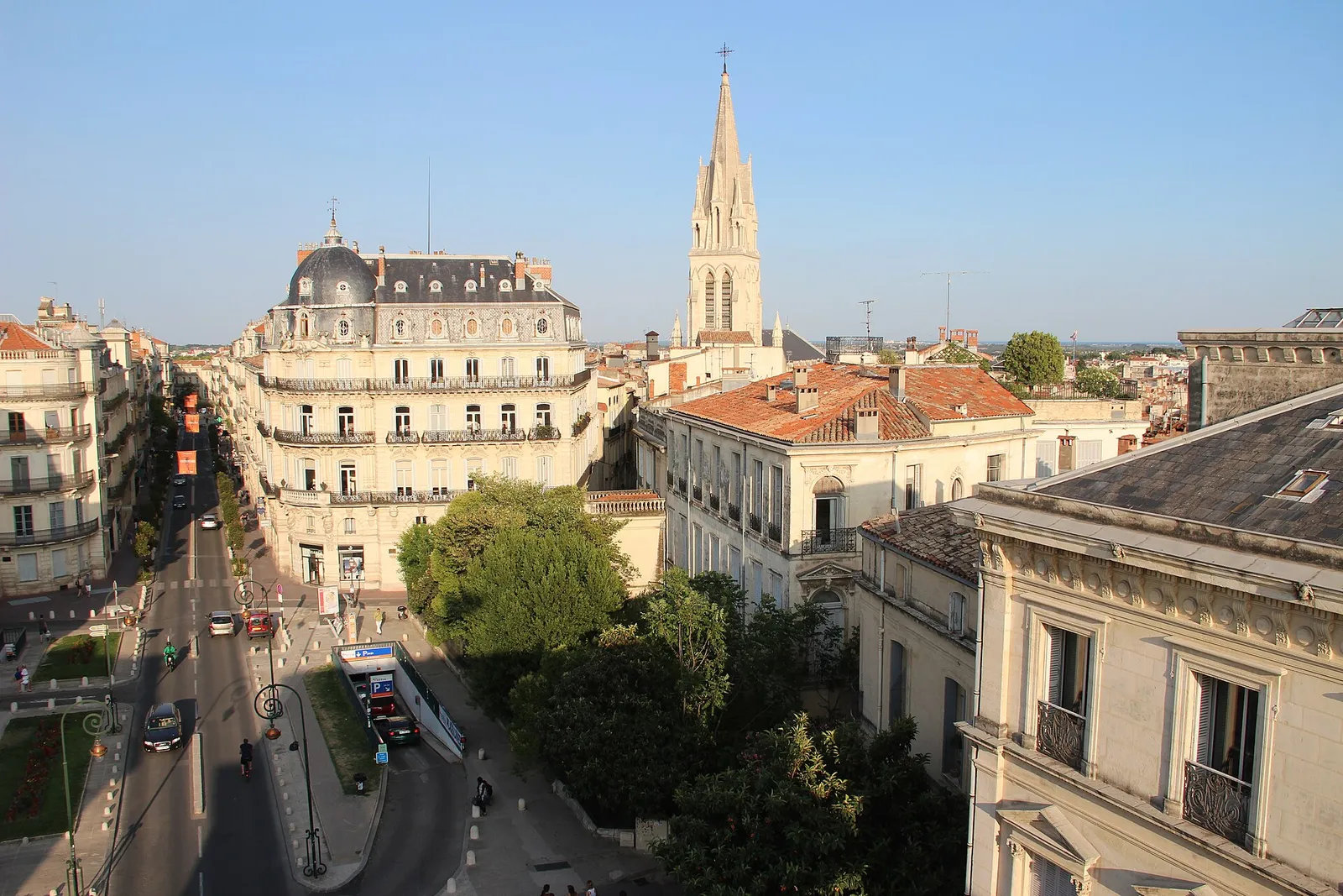 Central Montpellier and the spire of Sainte-Anne church seen from the Porte du Peyrou