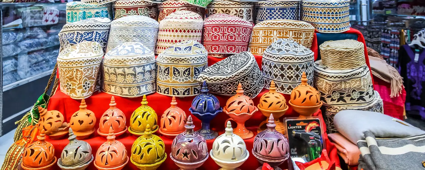 Traditional caps and incense burners in Mutrah Souq, Muscat