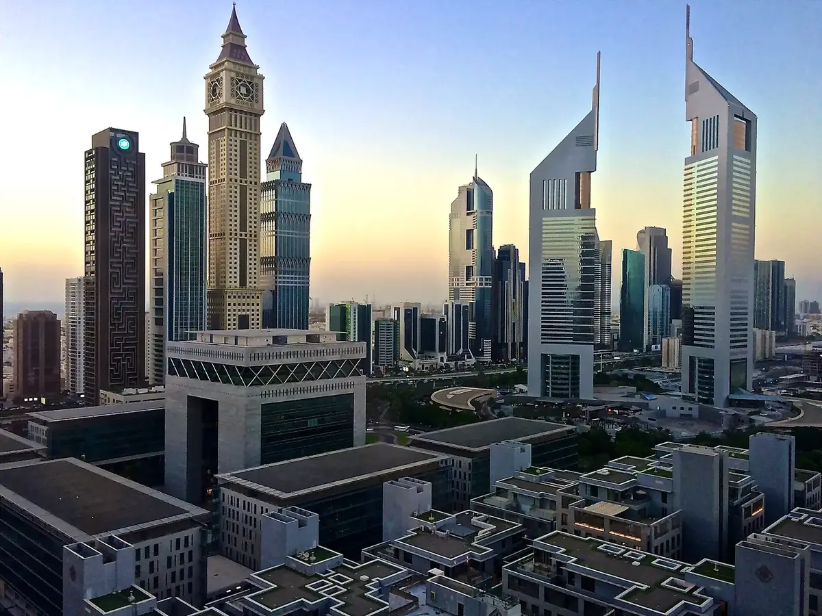 Emirates Towers and the Sheikh Zayed Road skyline at dawn, Dubai