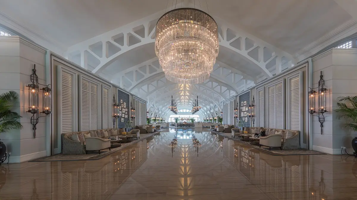 A hotel lobby with a chandelier