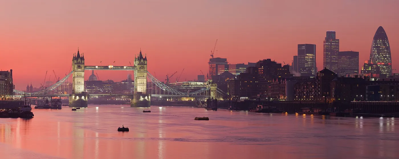 The Thames at sunset with Tower Bridge and the City of London